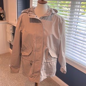 Woman’s Coach Waterproof jacket with hood size medium.